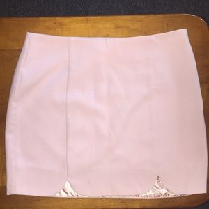 Light pink skirt with front pleats